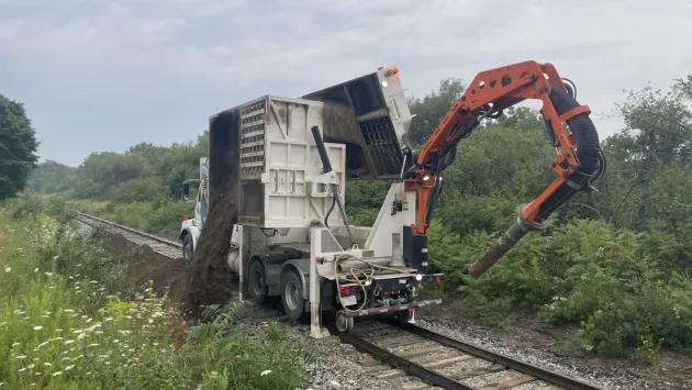 Excavation work in the railway track area.